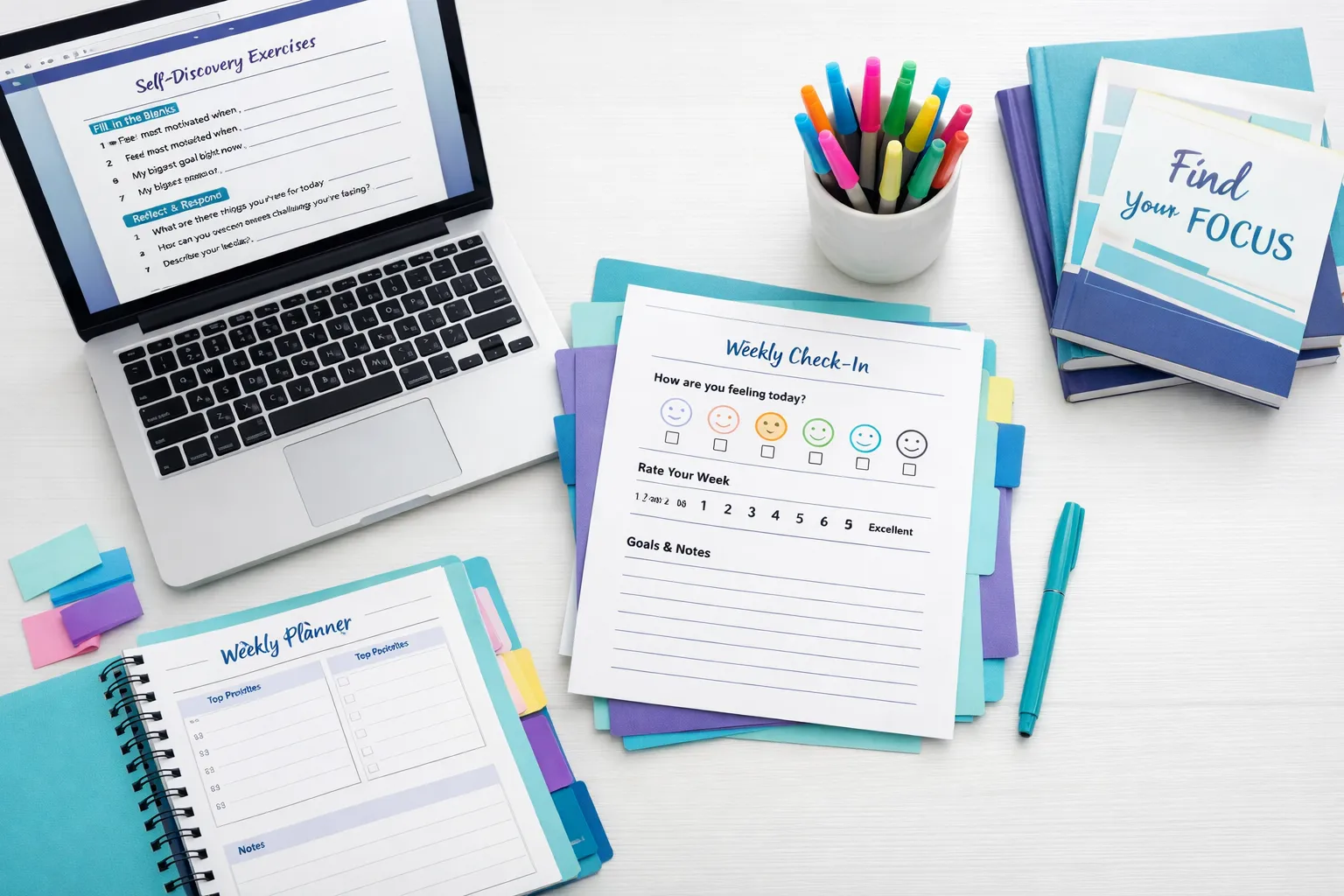 Workbook creation workspace with exercises on laptop, printed worksheet with checkboxes, coloured tabs, markers, and planner - AI workbook writing